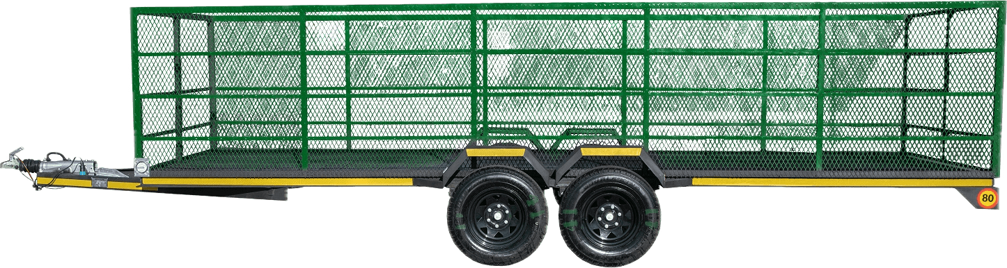 High-sided tandem trailer with green mesh sides